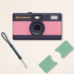 Appareil photo peeksme rose + 1 paire de clips vert + 1 lanière bleue