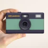 Appareil photo peeksme vert + 1 paire de clips rose + 1 lanière bleue