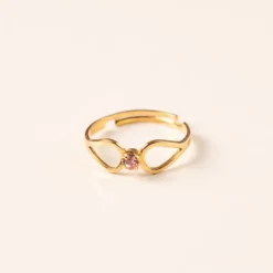 Bague réglable volutes cristal rose doré