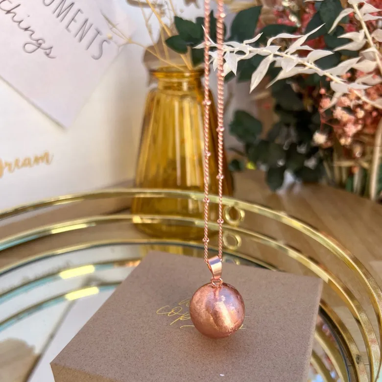 Bola de grossesse or rose