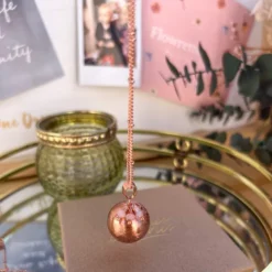 Bola de grossesse or rose swarovski