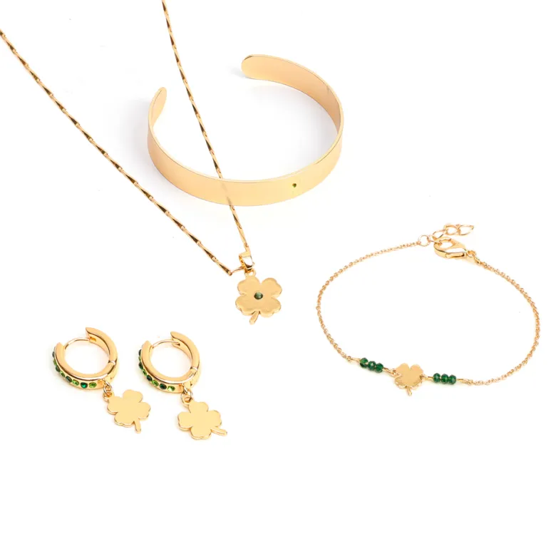 Boucles créoles en acier inoxydable doré motif trèfle et strass
