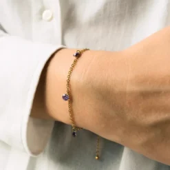 Bougie-bijou avec bracelet gouttes violettes