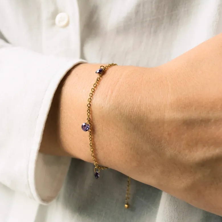 Bougie-bijou avec bracelet gouttes violettes