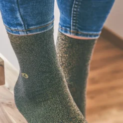 Chaussettes unies pailletées noir doré