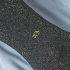 Chaussettes unies pailletées noir doré