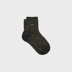 Chaussettes unies pailletées noir doré