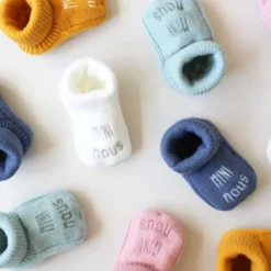 Chaussons naissance - mini nous #4f6887