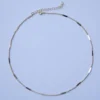 Collier ras du cou plaqué or 14 k , chaine fine, barres, doré