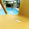 Fauteuil de jardin empilable en polypropylène - jaune moutarde
