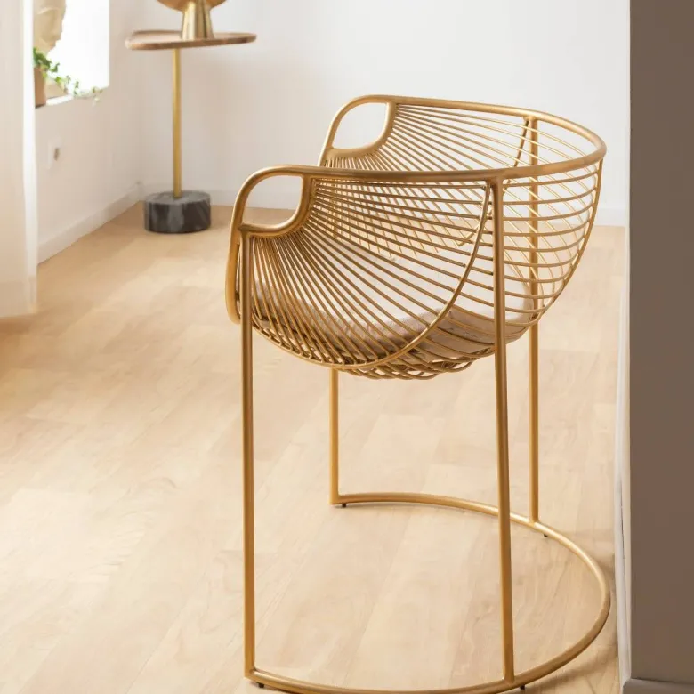 Fauteuil métal doré