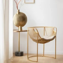 Fauteuil métal doré