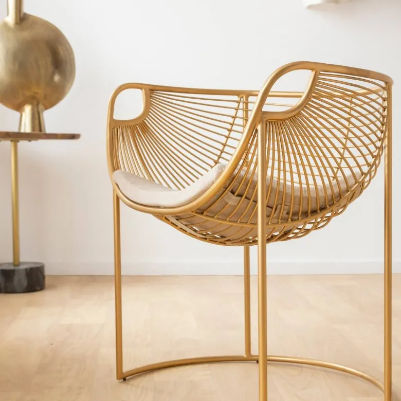 Fauteuil métal doré