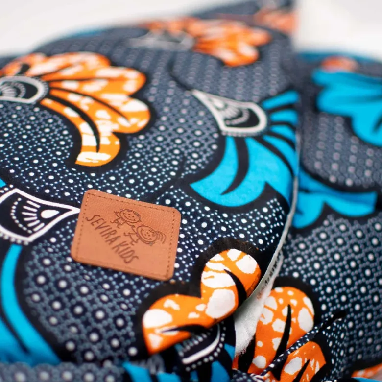 Gigoteuse emmaillotage coton wax bleu