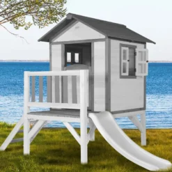 Maisonnette blanche sur pilotis lodge x