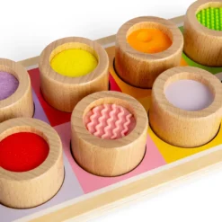 Planche sensorielle arc-en-ciel en bois