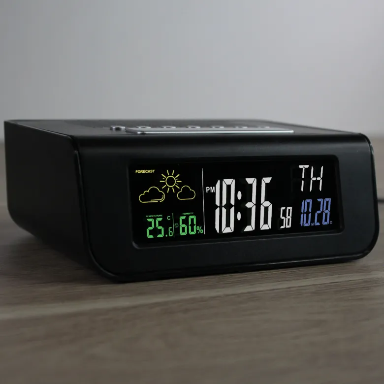 Radio-réveil station météo écran lcd couleur et radio fm 30 mémoires