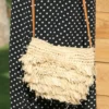 Sac en raphia naturel fait à bali lanière cuir porté épaule