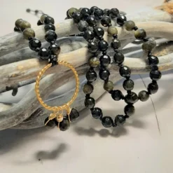 Sautoir mala obsidienne dorée