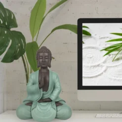 Statue bouddha méditation vert