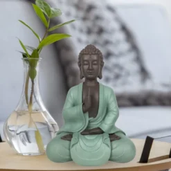 Statue bouddha méditation vert