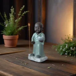 Statue bouddha porte encens aumone
