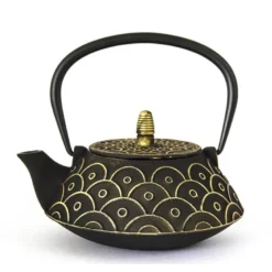 Théière fonte avec écailles dorées